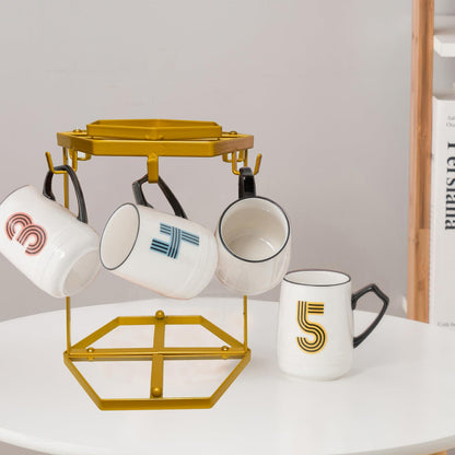 LWXPAIYY Coffee Mug Holder Countertop,Yellow Metal Coffee Cup Holders for Counter,Matte Muted Gold Mug Stand Rack for Counter Top 6 Hooks(Hexagon)