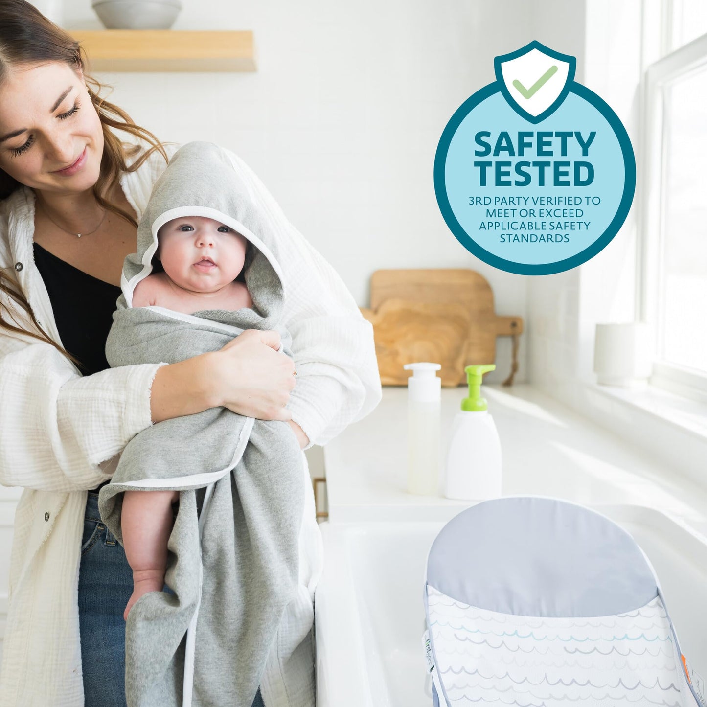 The First Years Sure Comfort Folding Baby Bather - Baby to Toddler Bath Tub - No-Slip Seat - for Sink or Tub Use