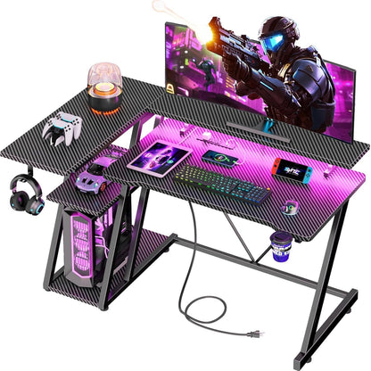 Korfile 40 Inch Gaming Desk with Power Outlet & LED Lights, L Shaped Computer Gaming Table with 3 Tiers Storage Shelves, Corner Gamer Desk with Monitor Stand for Small Space, Carbon Fiber Black