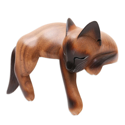 NOVICA Artisan Handmade Wood Statuette Sleeping Siamese Suar Cat Brown Indonesia Sculpture Painted [4.3in H x 6in W x 3.5in D] ' Sleeping Feline'