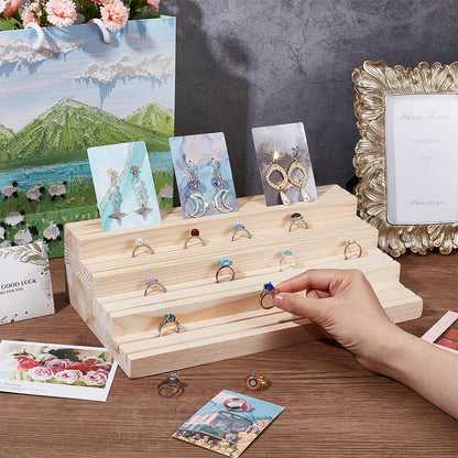 NBEADS 4-Tier Wood Jewelry Display Stand, Wooden Earring Organizer Holder with Grooves Jewelry Showcase Rack for Rings Earring Display Cards Photo Home Decorations