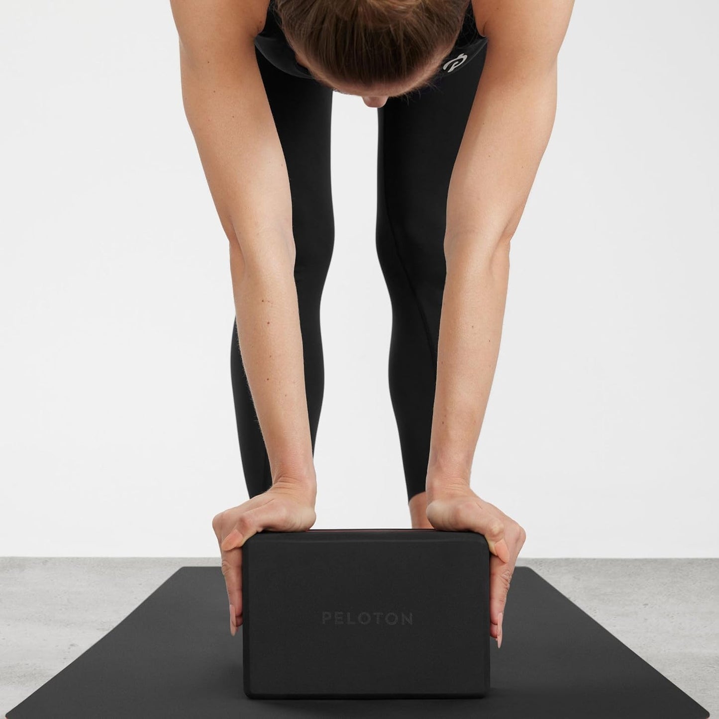 Peloton Yoga Block | Premium EVA Foam Yoga Blocks Available in Set of Two with Curved Edges and Corners, Accessories for Beginner and Advanced Yoga, 9 x 6 x 4 inches, Black/Red