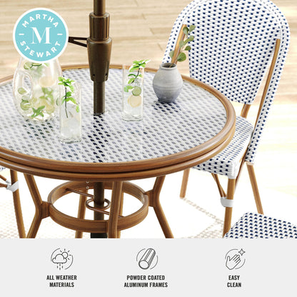 Martha Stewart Lily Pond 31” Round Indoor-Outdoor Bistro Dining Table with Aluminum Frame in Gray Woodgrain and Rattan Top in White/Gray with Tempered Glass Top