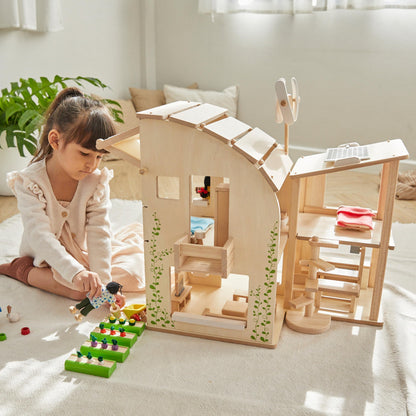 PlanToys® Green Wooden Dollhouse with Furniture | Eco Friendly Doll House with Solar Panel, Wind Turbine & Recycling System | Pretend Play Dollhouse for Sustainable Living Role Play