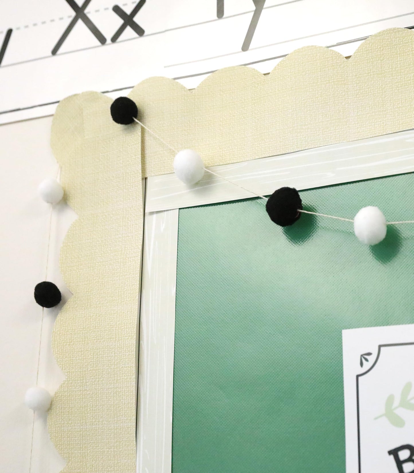 Carson Dellosa Education Garland 2 Piece Set, 12" Black and White Felt Pom Ball Banners on White String for Party, Classroom Decor, Bulletin Board, and Room Decoration