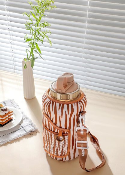 H2O Capsule 2.2L Half Gallon Wide Mouth Water Bottle with Storage Sleeve and Removable Straw - Hydration Tracker Jug with Measurements Marked – Shatterproof BPA-Free, (Libra Zebra)
