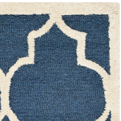 SAFAVIEH Cambridge Collection Accent Rug - 2' x 3', Navy & Ivory, Handmade Moroccan Trellis Wool, Ideal for High Traffic Areas in Entryway, Living Room, Bedroom (CAM134G)