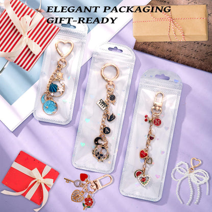 Wurosi 544Pcs Charms Lip Gloss Keychain Making Kit, Bag Charm Kits with Key Chain Hooks, Charms, Chains, Jump Rings, Lobster Clasps, Plier, Gift Bags & Tools, DIY Craft Supplies, Valentines Gifts
