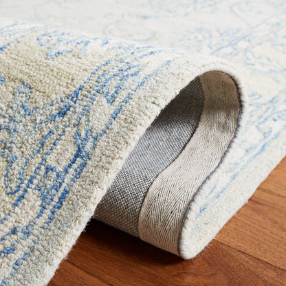 SAFAVIEH Micro-Loop Collection Accent Rug - 2'3" x 5', Blue & Beige, Handmade Wool, Ideal for High Traffic Areas in Entryway, Living Room, Bedroom (MLP535M)
