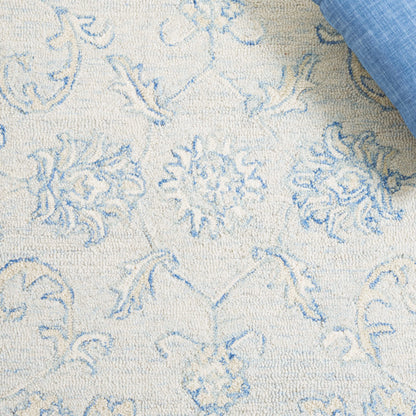 SAFAVIEH Micro-Loop Collection Accent Rug - 2'3" x 5', Blue & Beige, Handmade Wool, Ideal for High Traffic Areas in Entryway, Living Room, Bedroom (MLP535M)