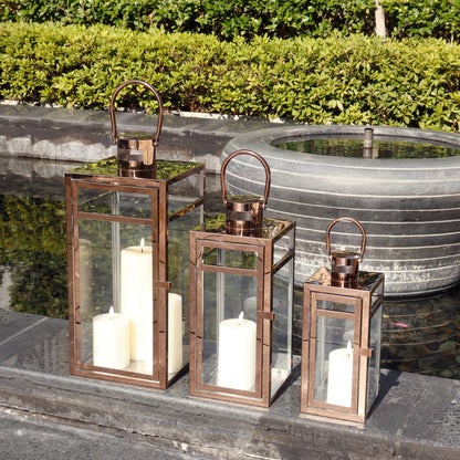TRIROCKS Set of 3 Stainless Steel Candle Lantern 19/15/12'' High Metal Candle Holder with Tempered Glass Panels Perfect for Home Decor Living Room Parties Events Tabletop Indoors Outdoors (Rose Gold)