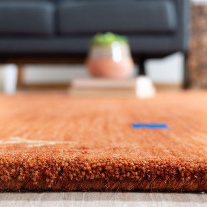 SAFAVIEH Himalaya Collection Accent Rug - 4' x 6', Rust, Handmade Boho Tribal Wool, Ideal for High Traffic Areas in Entryway, Living Room, Bedroom (HIM563P)