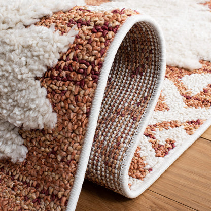 SAFAVIEH Moroccan Tassel Shag Collection Area Rug - 6'7" x 9'2", Orange & Ivory, Boho Design, Non-Shedding & Easy Care, 2-inch Thick Ideal for High Traffic Areas in Living Room, Bedroom (MTS652P)