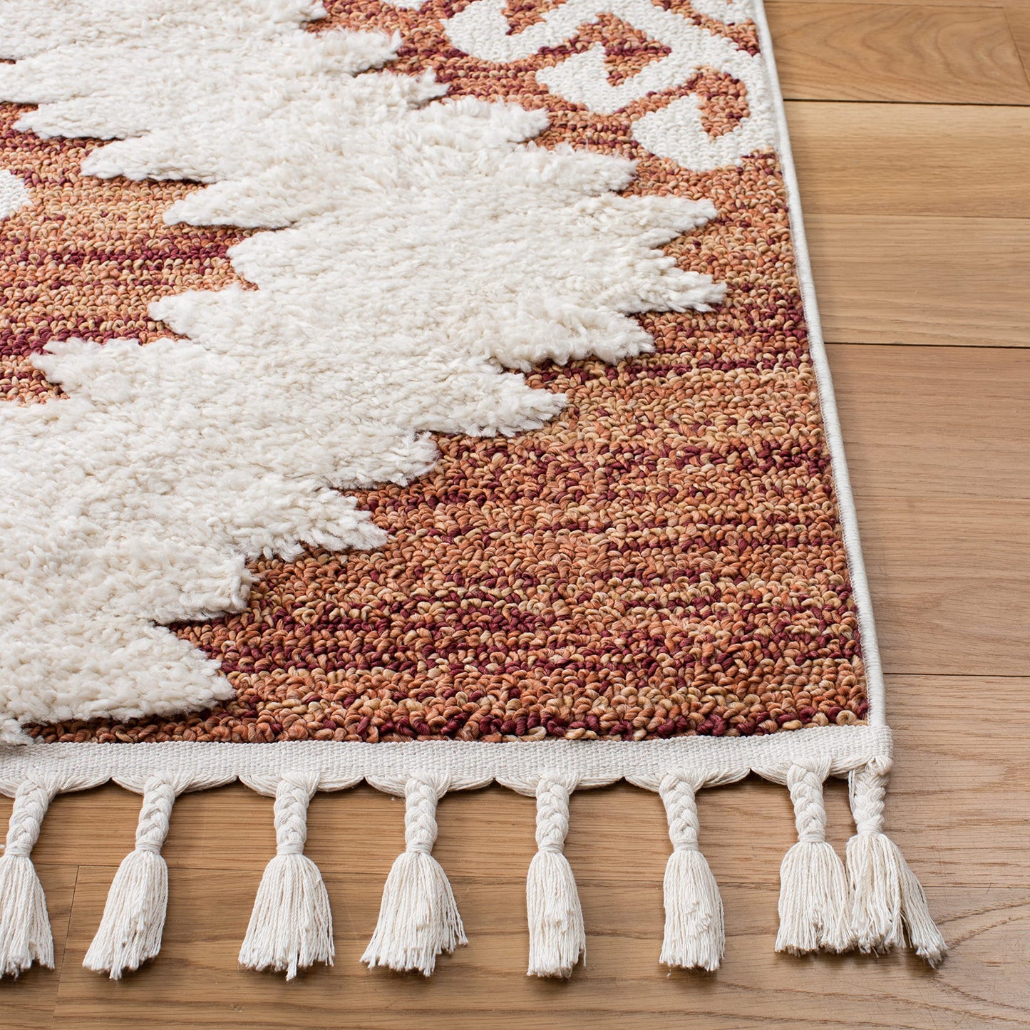 SAFAVIEH Moroccan Tassel Shag Collection Area Rug - 6'7" x 9'2", Orange & Ivory, Boho Design, Non-Shedding & Easy Care, 2-inch Thick Ideal for High Traffic Areas in Living Room, Bedroom (MTS652P)