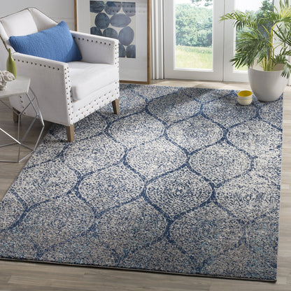 SAFAVIEH Madison Collection Area Rug - 6'7" x 9'2", Navy & Silver, Glam Ogee Trellis Distressed Design, Non-Shedding & Easy Care, Ideal for High Traffic Areas in Living Room, Bedroom (MAD604G)